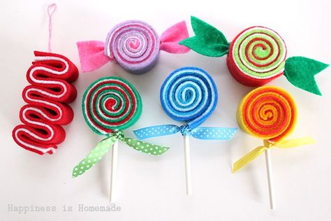 These sweet DIY felt candy ornaments are adorable! They only take a few minutes to make, and cost next to nothing! Great Christmas gift idea, too! Felt Candy Ornaments, Felt Candy, Candy Christmas Tree, Happiness Is Homemade, Candy Ornaments, Homemade Ornaments, Candy Decorations, Candy Christmas Decorations, Diy Felt