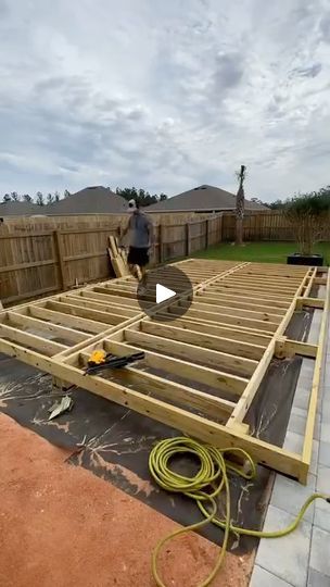 is it CHEAPER to BUILD a DECK (diy style) or to HIRE a CONTRACTOR | is it CHEAPER to BUILD a DECK (diy style) or to HIRE a CONTRACTOR?  #deck #deckbuilding #deckdesign #decking #carpentry | By Designs by Donnie | Is it cheaper to build your own
deck, DIY style, or to hire a contractor? Let's find out. But
why go small when we can go huge and save more money. Oh
yeah, in the space, this is where we're going to build it.
Starting with the layout lines, we're going to get this baby
nice and square. Before I go over the price quotes from
contractors and the cost breakdown to go the DIY route?
I wanted to take a beat and explain why I've been DIYing so
many outdoor projects lately. You see, Last year, we bought
this house and it was a boring builder-grade home although we
loved it but basically How To Build A Deck, Back Deck Ideas, Low Deck Designs, Wood Deck Plans, Ipe Deck, Deck Patterns, Deck Diy, Build A Deck, Platform Deck