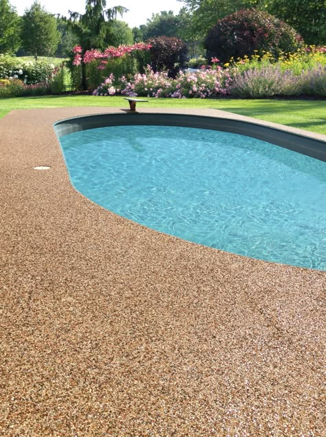 At Nature Stone we create gorgeous pool decks. Call us today at 877-268-0477 for your FREE in-home estimate, or go to our website! Pool Floor Colors, Stone Around Pool, Stone Carpet, Concrete Patio Makeover, Pool Repair, Swimming Pool Decks, Pool Renovation, Pool Remodel, Pool Colors