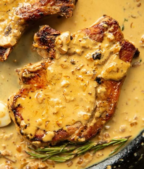 Juicy pan-fried pork chops drenched in a simple and delicious garlic sauce. | www.dontgobaconmyheart.co.uk Turkey Loin, Southern Smothered Pork Chops, Ready Recipes, Pork Chop Sauce, Puff Pastry Chicken, Smothered Pork Chops Recipe, Pan Fried Pork Chops, Pork Sauce, Smothered Pork