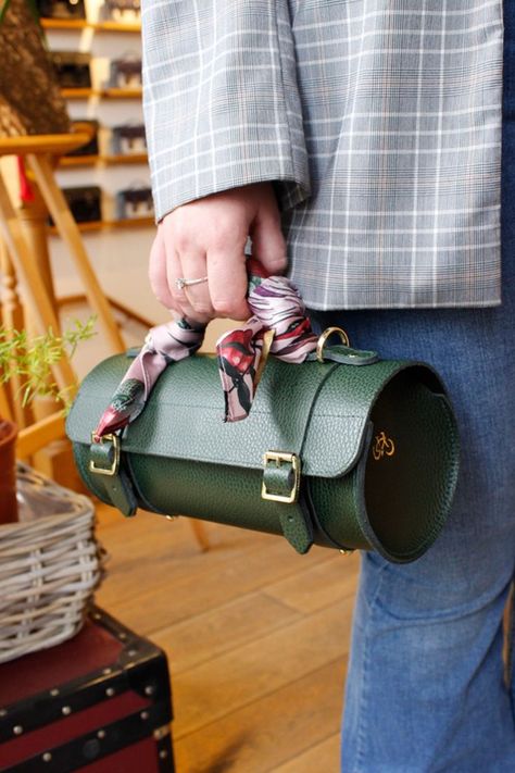 womens green leather cylindrical crossbody bag styled with a colourful scarf on the handle - travel outfit - The Bowls Bag in Racing Green from The Cambridge Satchel Co. Antique Fairs, Racing Green, Cambridge Satchel, The Tube, Cambridge Satchel Company, High Quality Leather, Leather Bags, About Uk, Cambridge