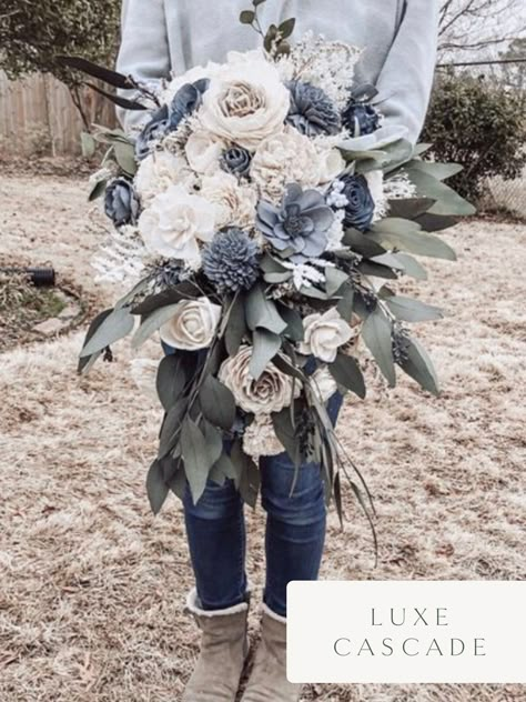 Dusty Blue Winter Wedding Flowers, Blue Boho Bridal Bouquet, Flower Bouquet Cascading, Dust Blue Wedding Bouquet, Dusty Blue Cascading Bouquet, Dusty Blue Sage And Gold Wedding, Dusty Blue Navy And Greenery Wedding, Navy Wedding Flowers Bouquets, Sage Green And Dusty Blue Bride Bouquet