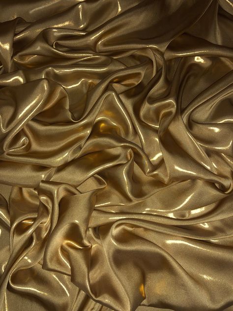 "Shimmer satin fabric :- shiny wet look satin fabric  shiny gold in colour  its colour is gold and has gold shimmer on it width is 58\" inches(147cm) soft feel medium weight smooth shiny fabric  can be used for multiple projects dresses,crafts,wedding,upholstery,bedding,table tops ,curtains,costumes, cushions etc this price is for one meter and if you will buy more than one meter it will come as one continuous length  please note that we try our best to get the actual colour of the fabric but be Metal Lighter, Upholstery Bed, Paris Mode, Gold Aesthetic, Shiny Fabric, Gold Satin, Craft Wedding, Gold Silk, Dress Crafts