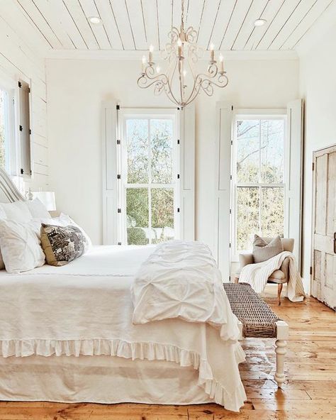 French Farmhouse Bedroom with shiplap ceiling, shutters, chandelier, and rustic wood floors French Farmhouse Bedroom, Rustic Wood Floors, Shiplap Ceiling, Dream Farmhouse, French Farmhouse, Farmhouse Bedroom, Shutters, Rustic Wood, Wood Floors