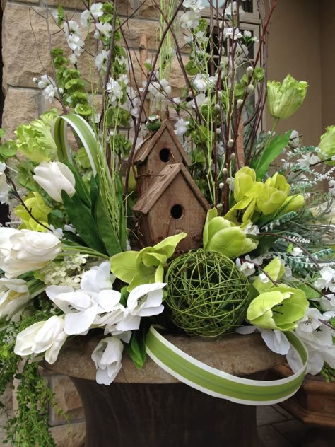 Spring Urn Planter Ideas, Spring Flower Containers, Bird House Flower Arrangements, Spring Planters Outdoor, Spring Porch Planters, Easter Urns Front Porches, Easter Floral Arrangements For Church, Spring Church Decorations, Spring Flower Arrangements For Church