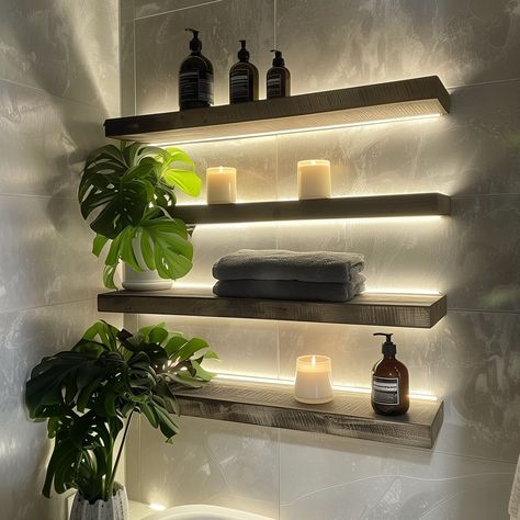 Three_backlit_floating_shelves_in_a_bathroom._The_to 4 Floating Shelf Ideas, Wall Shelves Living Room, Organizing Essentials, Long Floating Shelves, Bathroom Shelves Over Toilet, Floating Shelves Bedroom, Spa Interior Design, Floating Shelf Decor, Bathroom Tips