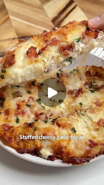 iRick Wiggins on Instagram: "Say “YUM” if you would eat this Chicken Alfredo Stuffed Cheesy Garlic Bread 😋🙌

How to make it:

Spread cream cheese on a low-carb tortilla and top it with chicken, spinach, Alfredo sauce, mozzarella, and another tortilla. 

Then add more Alfredo, mozzarella, bacon and garlic butter. Bake on a parchment lined sheet @ 400F for 20 mins & enjoy!" Chicken Alfredo Stuffed Cheesy Garlic Bread, Chicken Alfredo Stuffed Garlic Bread, Alfredo Bread, Spinach Alfredo Sauce, Snack Man, Irick Wiggins, Fasting Lifestyle, Egg Custard Recipes, Cheesy Garlic Bread Recipe