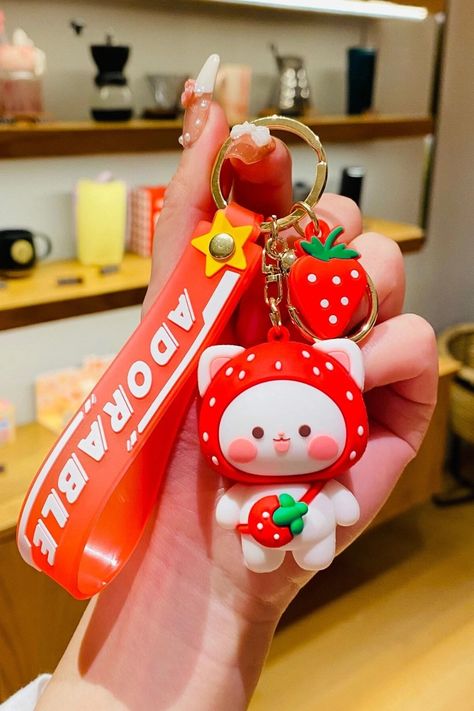 These keychains are well made. This is an adorable keychain. These are super cute and of great quality. #women #girls #cute #keychain Adorable Keychains, Cat Strawberry, Fruit Cat, Barang Aesthetic, Key Decorations, Clay Keychain, Diy Crochet Bag, Strawberry Charm, Small Dolls