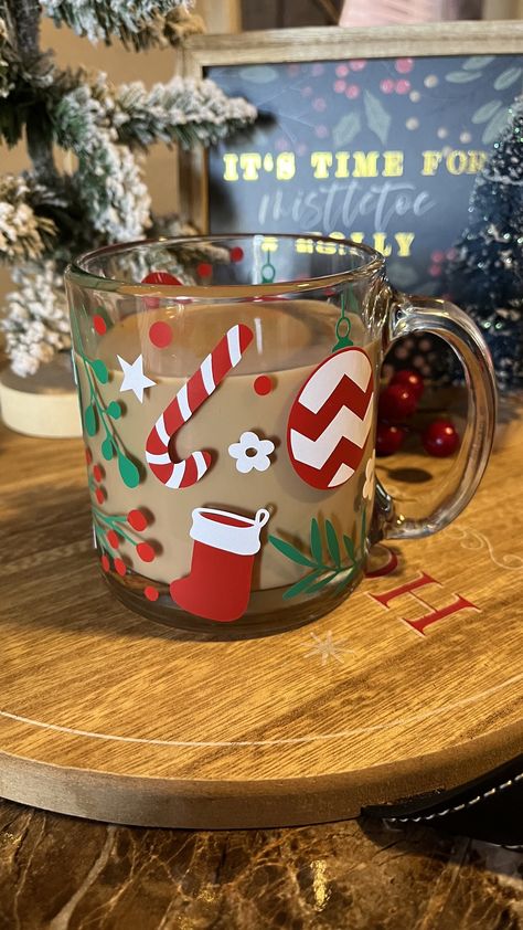 This libbey glass mug is the perfect holiday 🎄cup for all your holiday hot cocoas, peppermint mocha coffee and any holiday beverage you choose  🎄Details🎄 13oz clear glass mug  Design is made from  High quality, permanent vinyl that will withstand daily use and washings.  I strive for consistency and perfection, however, every item is hand-made with love, which means they may vary in color, size, etc.  Care Instructions:  Handmade with Love, So Handle with Care! Each cup comes with a care card Christmas Coffee Mug Ideas, Coffee Glass Cup Design Christmas, Cricut Christmas Mugs, Christmas Mugs Cricut, Christmas Cup Designs, Peppermint Mocha Coffee, Christmas Coffee Mugs, Holiday Mugs, Christmas Cups