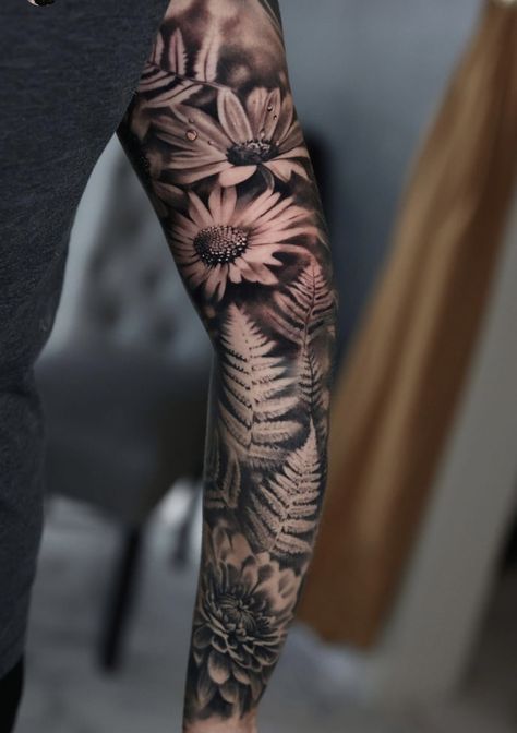 Black and gray daisy, fern, and chrysanthemum tattoo Flowers With Shading Tattoo, Black White Sleeve Tattoo, Black And Grey Floral Leg Sleeve, Gray Shading Tattoo, Black And Grey Tattoo Filler, Blacked Out Tattoo With White Ink, Greywash Tattoo Ideas, Realism Floral Tattoo Sleeve, Black And Gray Tattoo Ideas