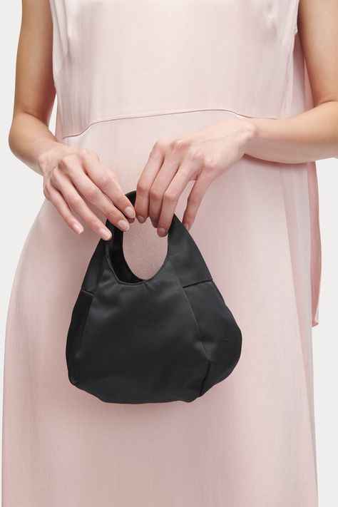 A mini version of our squashy hobo bag with a twisted top handle in Double Duchess taffeta. 100% Polyester Made in China Need help finding your size? Chat with us. Tufted Bag, Bag Shoot, Twisted Top, Tiny Bag, Hobo Tote Bag, Sketch Style, Black Camel, Bag Design, Rachel Comey