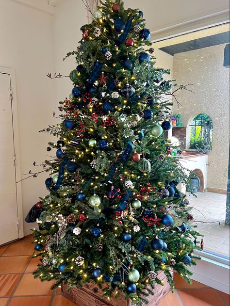 Navy Green White Christmas, Blue And Green Christmas Tree Ideas, Navy And Burgundy Christmas Decor, Navy And Green Christmas Tree, Red Green Blue Christmas Tree, Peacock Theme Christmas Tree, Masculine Christmas Tree, Green And Blue Christmas Tree, Christmas Tree Decorations Green