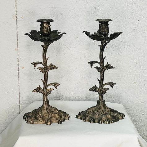 Add beauty to any tabletop with these whimsical wild flower cast metal candlesticks. Normal vintage wear and discoloration. Beautiful addition to French, farm house, English and traditional decor. Victorian Chic Decor, Mantle Decor Vintage, Goth Fairy Decor, Witchy Chic Decor, Vintage Decor Items, Victorian Era Decor, Whimsy Home Decor, Checkered Home Decor, Vintage Whimsical Decor