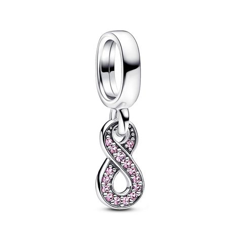 From Pandora, show your love spans to infinity and beyond with the Sparkling Infinity Dangle Charm. The ultimate symbol of everlasting connection, the infinity symbol has been reimagined in a slightly asymmetrical shape featuring pink sparkle on its front side. Attached to the bail at the top with its smaller loop, this infinity charm features a heart shape cut-out on the back where its parts overlap. Gift it to a friend of a family member to let them know your bond will last forever and beyond. Pandora Jewelry Charms, Pandora Pink, Pandora Heart, Charms Pandora, Infinity Charm, Pandora Beads, Bracelet Pandora, Jewelry Charms Pendants, Pandora Bracelet Charms