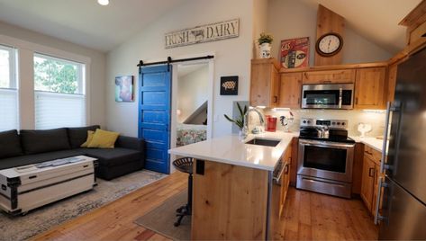 Living Large in a 520 SqFt Garage Apartment - Tiny House Blog Garage Suites Living Spaces, Above Garage Apartment Layout, Diy Garage Apartment, Above Garage Studio Apartment, Above Garage Apartment Interior, Garage Turned Into Apartment, Garage Loft Apartment, Garage Apartment Interior, Garage Studio Apartment