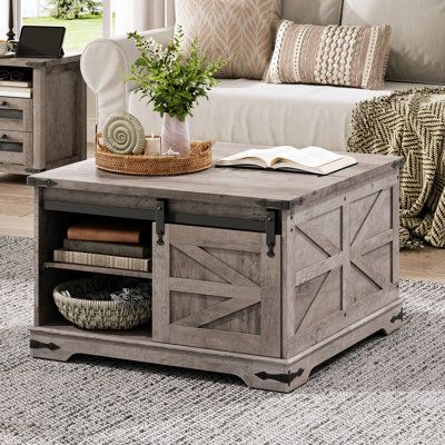 Farmhouse coffee table, perfect for home, perfect for life!- This coffee table focuses on functionality, featuring hidden flip-top storage and barn door storage, as well as adjustable shelf storage. Whether it's convenient storage or organizing your belongings, it can meet your needs.- The coffee table showcases a framing design that is unique and aesthetically pleasing. It will become one of the highlights of your home space, bringing you convenience, comfort, and visual enjoyment.- Placed in t Rustic Square Coffee Table, Barn Door Storage, Framing Design, Farmhouse Color, Large Square Coffee Table, Diy Tables, Diy Dining Room Table, Farmhouse Coffee Table, Nightstand Decor