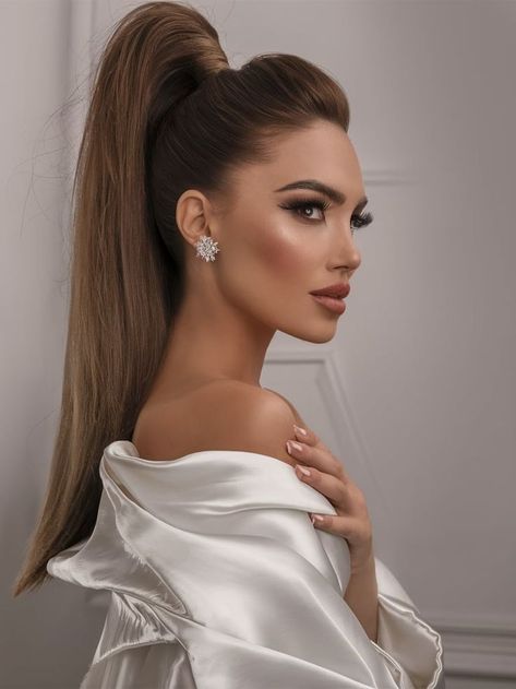 A glamorous high ponytail with smooth, sleek sides and voluminous length. The hair is pulled back tightly at the crown, giving the face a lifted appearance, while the cascading ponytail adds drama and elegance. Perfect for formal events or red carpet occasions. Glam High Ponytail, Formal Hair Ponytail, Cascading Ponytail, High Pony Wedding Hair, Sleek High Ponytail, High Ponytail, High Ponytails, Winter Hairstyles, The Crown