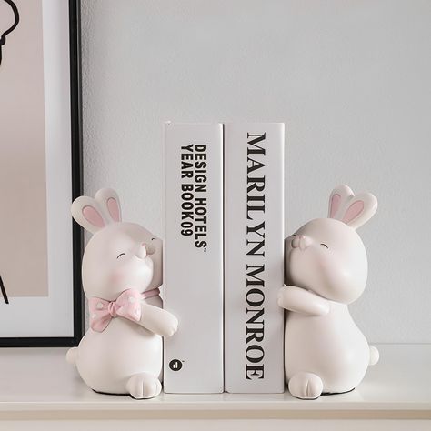 PRICES MAY VARY. Adorable Design: These Rabbit Bookends are the perfect way to add a touch of cuteness to your bookshelf or desk. The cute and charming rabbit design is sure to bring a smile to anyone's face. Non-Slip Base: Keep your books neatly organized with the non-slip base that ensures they stay in place. No more sliding or tipping over. Perfect for Kids' Rooms: These bookends are the perfect addition to any child's room. Use them to hold up your child's favorite bedtime stories or simply Kids Bookends, Cute Hug, Decorative Bookends, Furniture Handle, Book Ends, Book Holders, Unique Book, Soft Yellow, Cute Rabbit