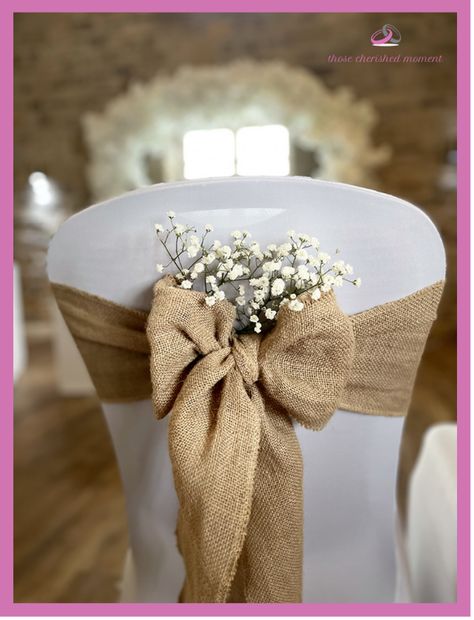 Hessian Bow with added Gypsophila for Wedding Chair Decorations. Hessian Chair Bows, Rustic Wedding Chair Cover Ideas, Wedding Decorations Traditional, Wedding Chair Decorations Diy Cheap, Wedding Bows Decorations, Hessian Wedding Ideas, Wedding Chair Deco, Wedding Chairs Decorations, Chair Bows Wedding