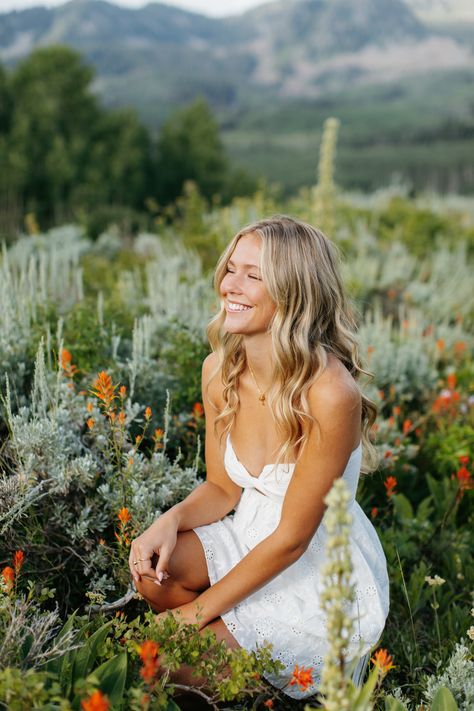 Outfits. Wasatch Mountains. Dreamy Mountain Portraits. Sunset in the Mountains. Utah Senior Photographer. Utah Wedding Photographer. Park City Photographer. Park City Senior Picture Photographer. Summer senior pictures. Summer in the mountains. Summer sunsets. Self Love. Self love portrait photography. Flower Field. Flower portrait. White summer dress City Themed Senior Pictures, Field Of Flowers Senior Pictures, Pictures In Wildflowers Fields, Flower Garden Pictures With People, Floral Dress Senior Pictures, Floral Field Photoshoot, Wild Flowers Photoshoot, Blonde Senior Pictures, Indian Senior Pictures