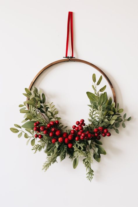 Wire Hanger Wreaths Diy, Gold Ring Wreath Diy Christmas, Embroidery Hoop Christmas Wreaths, Embroidery Ring Wreath, Embroidery Hoop Christmas Decor, How To Christmas Wreath, Gold Ring Christmas Wreath, Wreath On Door With Window, Christmas Wreath Embroidery Hoop