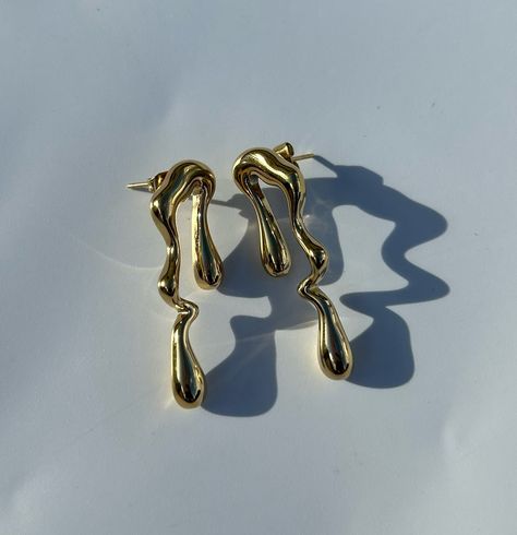 Lyric earrings 1500/= 18k gold plated Stainless steel material Available #s_cjewels #jewelryaddict Gold Statement Jewelry, Jewelry Product Shots, Asymmetrical Earrings, Minimal Jewelry, Catania, Jewelry Business, Accessories Store, Stainless Steel Jewelry, Stainless Steel Material