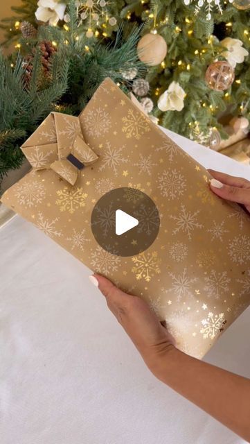 Chantel Mila Ibbotson on Instagram: "How to wrap your shirt… like a shirt! 👔 this fun wrap is so perfect for clothes and to add some extra fun and joy this festive season. Check out my previous video on making a bow from excess wrapping for a tutorial on how to make the paper bow 🎁 will you be trying this easy fold? 

#giftwrapping #giftwrap #christmas #christmas2022 #christmastime #christmasgram #festiveseason #festivejoy #christmasdecor #howto #howtowrap #mamamilastips" Making A Bow, Paper Bow, How To Wrap, Deck The Halls, How To Make Bows, Festival Season, Gift Wrap, Christmas Time, Art Inspiration