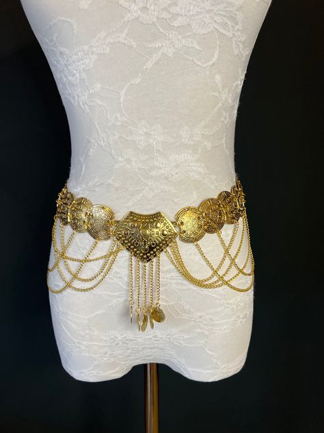 Belly Chain belt in Antique Gold finish with chain and coin detail. The large discs and intricate designs make this a stand out piece! Price per piece Unique Belts, Gold Waist Chain, Egyptian Jewellery, Medusa Costume, Coin Belt, Angel Outfit, Goddess Jewelry, Gold Belt, Belt Jewelry