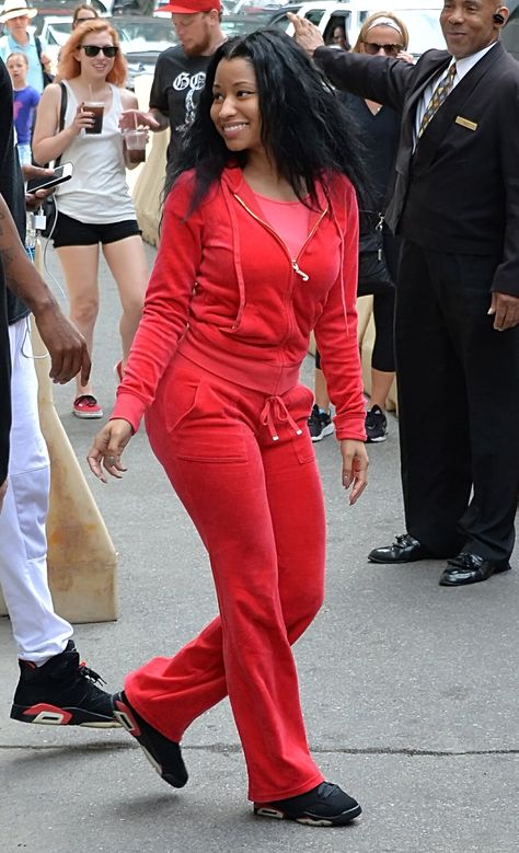 Nicki Minaj, dressed down in an all red Juicy tracksuit, leaves her hotel Juicy Couture Track Suit Aesthetic, 2000s Tracksuit, Juicy Track Suit, Juicy Couture Track Suit, 2000s Juicy Couture, Juicy Couture Clothes, Juicy Tracksuit, Red Tracksuit, Juicy Couture Tracksuit