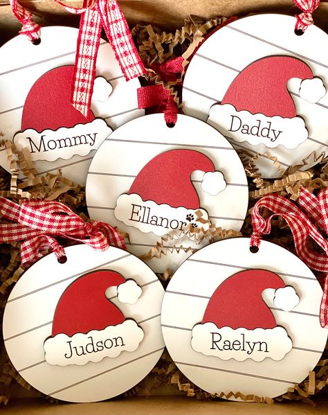 NOW with the option to add 2022 to the base of the ornament!  Add a sweet touch to your Christmas tree with personalized Faux Shiplap SANTA HAT or STOCKING ornaments for the entire family, even the pets!  These ornaments can be handed down through the years and become cherished keepsakes.  Coordinating ribbons are included, and the style of ribbon will vary depending on what we have on hand.  (Faux shiplap is a solid surface with the lines etched into the material.) Hat Ornaments, Fall Dec, Stocking Ornaments, Fancy Christmas Ornaments, Fancy Christmas, Faux Shiplap, Stocking Ornament, Family Pets, Fancy Hats