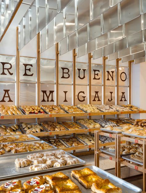 Concentrico's Design for Mi Pan Creates Community and Honors Traditional Mexican Bakeries - Architizer Journal Bread Of The Dead, Mexican Bakery, Bakery Interior, Land Of The Living, Real Bread, Bakery Display, House On Stilts, Terrazzo Flooring, Metal Trays