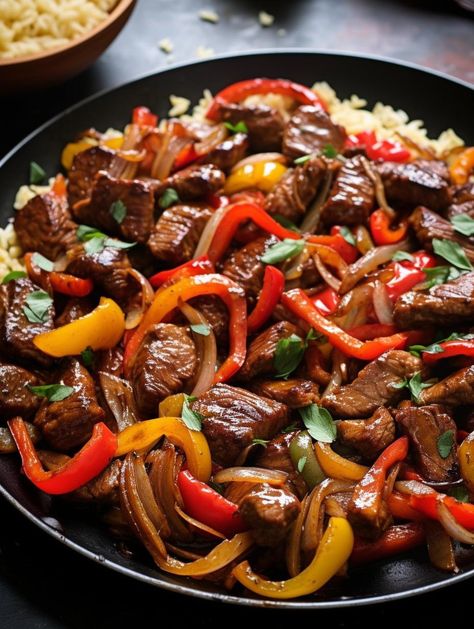 Experience a captivating blend of flavors in this simple yet delicious Peppered-Curry Beef Stir Fry. Enhanced by tamari and hoisin sauce, the sirloin bathes in a savory curry delight. Coupled with sweet brown sugar and vibrant red peppers, this dish is completed by serving it on a bed of fluffy jasm Stir Fry With Peppers, Slow Cooker Pepper Steak, Spicy Beef Stir Fry, Pepper Steak Stir Fry, Curry Beef, Slow Cooker Stuffed Peppers, Sweet Bell Peppers, Beef Curry, Beef Stir Fry