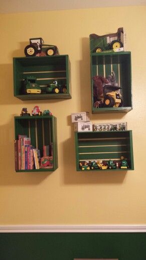 John Deere Nursery Milk Crate shelves. Toy Tractor Display Ideas, Boys Room Tractor Theme, John Deer Nursery Ideas, John Deere Room Ideas Kids, Tractor Room Decor Ideas, John Deer Bedrooms, Little Boys Tractor Bedroom, Tractor Boys Bedroom, Farm Nursery Theme Gender Neutral