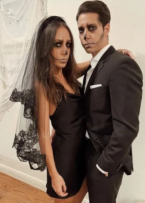 Do you want a simple but elegant bride and groom Halloween costume? If you do, then we’re pretty sure that you will fall in love with this concept.

#CreepyCoupleCostumes
#BrideAndGroomHorror
#SpookyWeddingAttire
#ImpressivelyCreepy
#HalloweenHorrorCouple
#GhoulishBrideAndGroom
#CreepyCostumeIdeas
#FrighteningFashion
#HauntedWeddingWear
#ChillingCouplesCostumes Disfarces Halloween Casal, Black Bride Costume Halloween, Dead Groom And Bride Costume, Goth Bride Costume, Black Bride Halloween Costume, Witch And Wizard Costume Couple, Dead Bride And Groom Costume, Dead Bride And Groom Halloween, Scary Halloween Couple