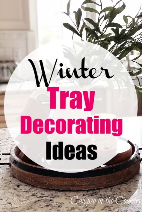 Cozy winter decorating ideas using trays. Idea to decorate a round tray on a kitchen island, a seagrass tray with winter white pitchers and other ideas from a group of home decor bloggers. See the blog for all the simple vignettes for winter using trays! Table Centres For Home, Table Centerpiece On Tray, Tray With Christmas Decor, Wood Tray Christmas Centerpiece, Xmas Tray Decor Ideas, Decorating Wooden Trays Ideas, Decorate A Tray On Coffee Table, Farmhouse Winter Tiered Tray Decor, Winter Table Top Decor