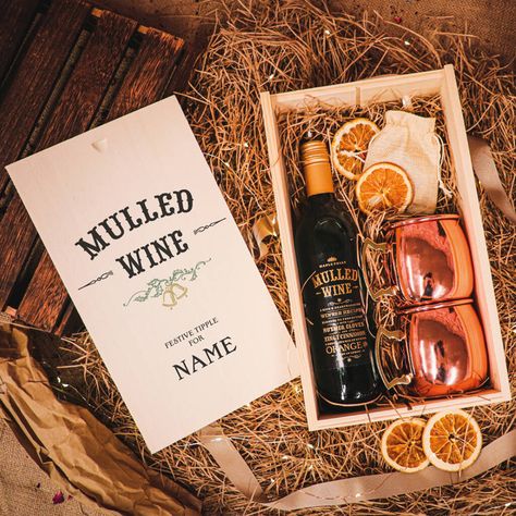 Our Personalised Mulled Wine Gift Set is the perfect Christmas Gift. Rustic packaging and personalisation. Occasion: We think our Personalised Mulled Wine Gift Set In Wooden Box makes a great gift for Christmas, Birthdays, Mothers Day, Fathers Day, Easter or simply 'just because'. Whatever the occasion your family or friends will be over the moon once they receive one of these luxurious personalised presents. The wicker hamper and fairy lights can also be re-used by the recipient. This product c Mulled Wine Gift, Christmas Mulled Wine, Rustic Packaging, Bottles Packaging, Hamper Gifts, Wicker Hamper, Wine Gift Set, Wine Gift Boxes, Wooden Gift Boxes