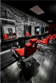 Red black and sleek Barbershop Store Fronts, Modern Barber Shop, Barbershop Design Interior, Best Barber Shop, Barber Shop Interior, Red Chairs, Hair Salon Design, Hair Salon Interior, Barbershop Design