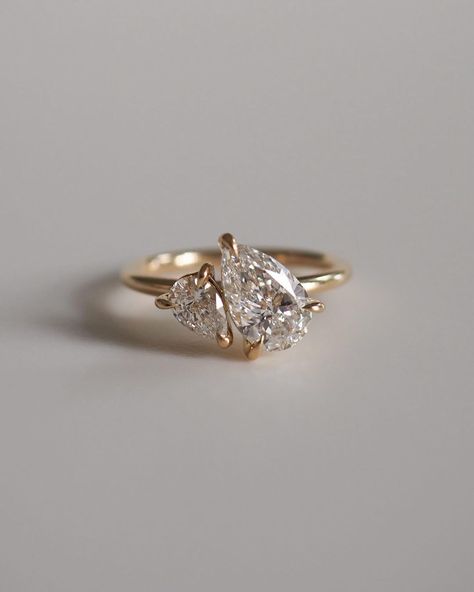 Spotlight on — Duet Pear Adorned with two perfectly proportioned 1.29ct & 0.35ct pear lab-grown diamonds, symbolising the profound… | Instagram Art Deco Pear Engagement Ring, Pear Cut Diamond Ring, Pear Diamond Rings, Pear Cut Ring, Pear Cut Diamond, Pear Engagement Ring, Pear Diamond, Platinum Metal, Proposal Ring