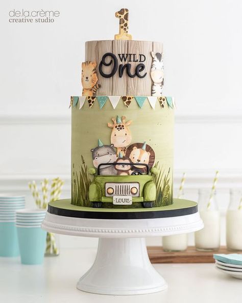 De la Crème Creative Studio on Instagram: "This cake is giving us all the summer vibes…and now the countdown is on to warm days relaxing in the sun. A safari vacation is definitely on my bucket list, who’s with me?! Now that I think about it, cake and safari animals obviously go great together, just look at them, they’re adorable! Holla at your girl if you think we should set up some cake classes in Africa, we can do two birds with one stone! 😜🦒🦓 By the way, see our earlier post for a close Safari Birthday Party Cake, First Birthday Decorations Boy, Safari Birthday Party Decorations, Zoo Cake, Safari Birthday Cakes, Jungle Theme Cakes, It Cake, Boys 1st Birthday Cake, Safari Vacation