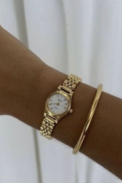 Elevate your looks with a little bit of jewelry, especially if you're a gold jewelry person. This watch & bracelet will be perfect on you. #jewelry #fashion Small Gold Watch Aesthetic, Classic Wrist Watch For Women, Gold Mini Watch, Gold Watch With Bracelets Women, Dainty Prom Jewelry, Gold Woman Watch, Women Gold Watches, Dainty Womens Watch, Gold Wrist Watch Women