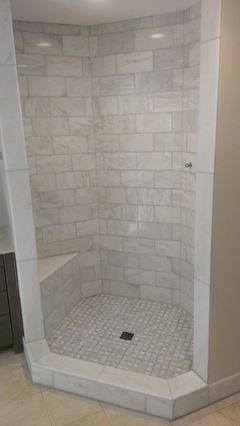 Fusion Pro Platinum w/ Carrara // http://www.houzz.com/discussions/936152/white-or-light-gray-grout-for-carrera-marble-tile-floor Carrara Tile Bathroom, Carrera Marble Bathroom, Craig Thompson, Marble Shower Tile, Lavatory Design, White Marble Bathrooms, Custom Tile Shower, Bathroom Shower Walls, Bathroom Redesign