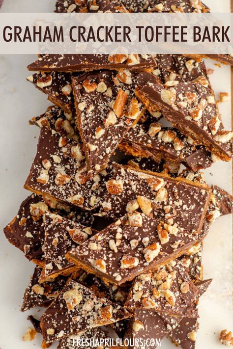 A twist on the classic toffee bark-- made with an easy butter and brown sugar toffee, this graham cracker toffee bark is a perfect sweet, salty, and sticky treat. Dress it up with festive sprinkles for holidays or other celebrations! via @frshaprilflours | easy graham cracker toffee bark recipes | toffee bark with graham crackers | christmas toffee bark | christmas bark easy cracker toffee | christmas toffee bark recipes Toffee Gram Crackers, Pretzel Cracker Bark Recipe, Christmas Tree Bark Recipe, Graham Cracker Toffee Bark, Christmas Toffee Bark Graham Cracker, Best Bark Recipes, Toffee Graham Cracker Squares 12 Tomatoes, Chocolate Toffee Bark Recipes, Graham Cracker Christmas Bark