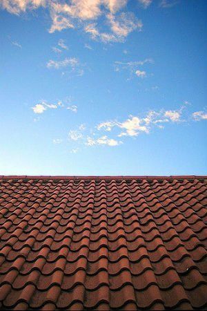 Tile Roofs 101: 4 Reasons Homeowners Love Clay, Concrete, and Slate - Bob Vila Clay Roofs, Florida Room, Roof Cleaning, Bob Vila, Watch Accessories, Architectural Design, Historic Buildings, House Floor Plans, Landscape Architecture