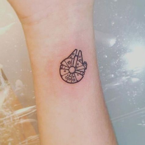 Samfarfan | Tattoo by @Samfarfan #fineline #finelinetattoo #starwars #millenianfalcon #star_wars #smalltattoo #tattoo #starwarstattoo #inked #ink #tattooed #geek #geektattoo #gametattoo #gamer #cinema #movietattoo #starwarstattoos | Tattoodo Star Trek Tattoo, Falcon Tattoo, Tattoos Infinity, Nerd Tattoo, Tattoo Schrift, Movie Tattoo, Movie Tattoos, Geek Tattoo, Gaming Tattoo