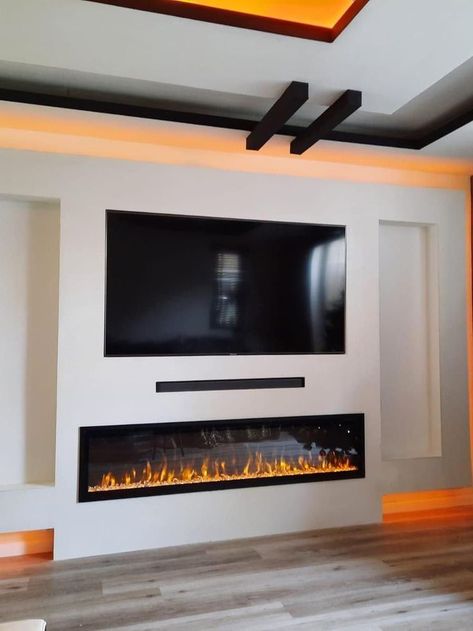 Tv Rum, Modern Fireplace Ideas Living Rooms, Electric Fireplace Living Room, Tv Unit Ideas, Faux Fireplace Mantels, Under Stair, Houston Houses, Under Tv, Classy Living Room