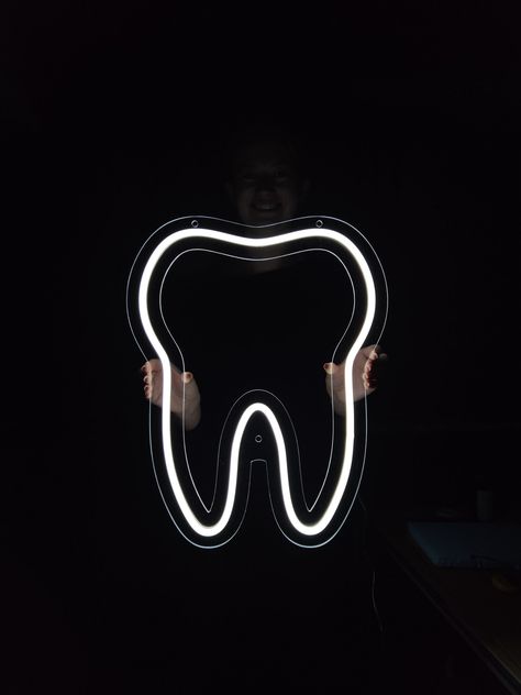 "👋 Write me, I can customize tooth neon sign for you😀 Change the color, add text to dental clinic neon sign or make a completely new sign from your logo or picture. I can also give you an example with the appearance of the inscription in different fonts from my catalog to make your choice easier. ❗ Tooth led neon sign is made by the best technology. All lines are straight and smooth as possible. Such signs are also ideal for placement not only at home, but also in offices and shops. After all, Green Dental Office, Dental Neon Sign, Dental Graphics, Light Up Wall Decor, Dentist Ideas, Tooth Logo, Dental Wallpaper, Dental Advertising, Dental Clinic Logo