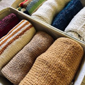 Knitionary: how to fold and store sweaters How To Roll Sweaters For Packing, Fold Sweaters For Drawers, Folding Sweaters For Drawers, Marie Kondo Folding Sweaters, How To Fold Long Cardigans, Bulky Sweater Storage, How To Store Jumpers, Best Way To Fold Sweaters, How To Fold Sweaters In A Drawer