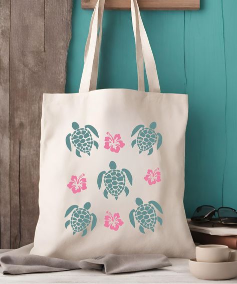 A classic cotton tote bag with sea turtles and hibiscus flowers!  This beachy tote bag is sure to please all the ocean animal lovers out there!  A fun conversation starter for every day use!  Sea Turtle Tote Bag, Hibiscus Bag Preppy Stuff Mermaidcore Coconut Girl Mermaid Core Mini Sea Turtle Gifts Seaturtle Cruise Accessories * Q U I C K * F A C T S * ✺ 100% cotton ✺ Bag size: 15"x 16" ✺ Heavy Cotton Fabric ✺ Handle Length: 20 inches (54.61cm) ✺ Open main compartment ✺ Colors may vary due to com Hibiscus Flower Tote Bag, Preppy Tote Bag, Cruise Accessories, Ocean Tote Bag, Handpainted Tote Bags, Sea Turtle Gifts, Bebidas Do Starbucks, Mermaid Core, Turtle Gifts