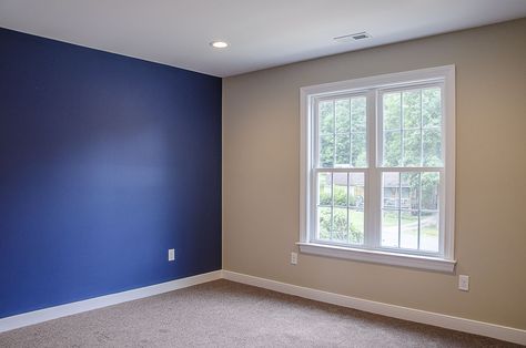 Master suite with blue royal blue accent wall ©Balducci Builders Accent Wall Blue Bedroom, Royal Blue Accent Wall Living Room, Royal Blue Accent Wall Bedroom, Royal Paint Wall Design For Bedroom, Royal Blue Wall Paint, Royal Blue Accent Wall, Royal Blue Room, Royal Blue Paint Colors, Boys Room Accent Wall