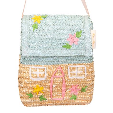 This charming cottage shaped bag is a brilliant accessory. Crafted from woven straw, lined and elegantly embroidered, it'll be a pleasure to use time and time again. Has a stylish cross body leather strap and handle with brass buckle. Lined woven straw. Stitched detail. Product dimensions: 6.25 x 7.5 x 3 inches